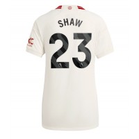 Camisa de Futebol Manchester United Luke Shaw #23 Equipamento Alternativo Mulheres 2023-24 Manga Curta